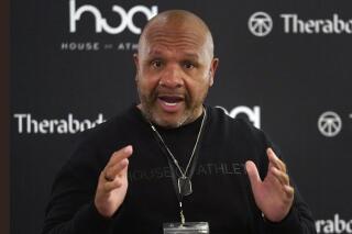 FILE - Former Cleveland Browns head coach Hue Jackson speaks during the first day of the House of Athlete Scouting Combine in Plantation, Fla., March 3, 2021. The Browns have spoken to an NFL investigator looking into claims by Jackson, who said the team intentionally lost games in 2016 and 2017. Jackson, now coaching at Grambling State, was fired by Browns owners Dee and Jimmy Haslam eight games into the 2018 season with a 3-36-1 record. He has said the team paid him bonuses to lose and that he believes he was set up to fail. (AP Photo/Wilfredo Lee, File)
