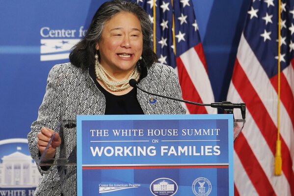 FILE - In this June 23, 2014, file photo, Tina Tchen, chief of staff to first lady Michelle Obama, speaks at the White House Summit on Working Families at a hotel in Washington. Time's Up has called on NBC Universal to release all former employees from non-disclosure agreements that might be preventing them from speaking out about sexual misconduct. Tchen, incoming president and CEO of Time's Up, says NBC Universal didn't go far enough with its statement, first reported by MSNBC's Rachel Maddow on Friday, Oct. 25, 2019, that employees should contact the company in order to be released from any "perceived obligation" to remain quiet. She says NBC should simply state that everyone is free to speak without fear of retaliation. (AP Photo/Charles Dharapak, File)