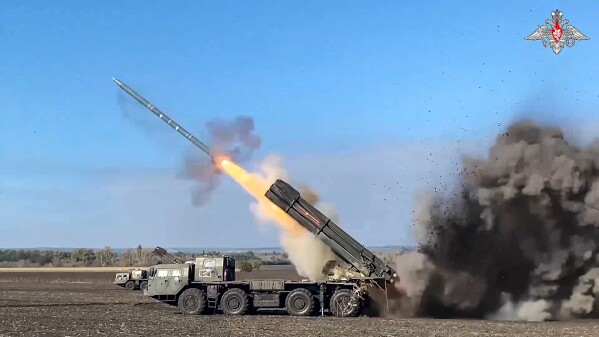 FILE - In this image taken from video released by the Russian Defense Ministry on March 21, 2024, a Russian rocket launcher fires at an undisclosed location in Ukraine. Russian troops have been ramping up pressure on exhausted Ukrainian forces across the front line to prepare to take more land this spring and summer. (Russian Defense Ministry Press Service via AP, File)