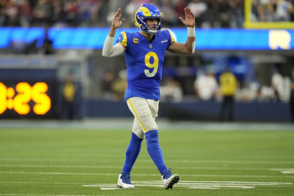 Los Angeles Rams quarterback Matthew Stafford (9) reacts after a touchdown during the second half of an NFL football game against the Washington Commanders Sunday, Dec. 17, 2023, in Inglewood, Calif. (AP Photo/Marcio Jose Sanchez)