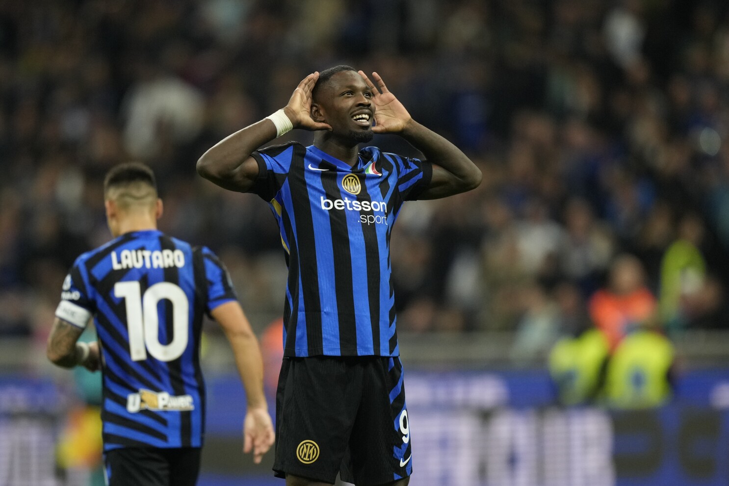 Marcus Thuram is transforming from an assist man to a leading goal-scorer at Inter | AP News