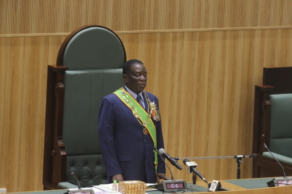 Zimbabwean President Emmerson Mnangagwa prepares to deliver his speech in parliament during his State of the Nation address in Harare,Zimbabwe, Oct. 3, 2023. Zimbabwe's main opposition party boycotted Tuesdays first State of the Nation Adresss by Mnangagwa since disputed elections in August, another sign of the widening political cracks in the southern African nation as allegations of post-vote clampdown on government critics continue.(AP Photo/Tsvangirayi Mukwazhi)