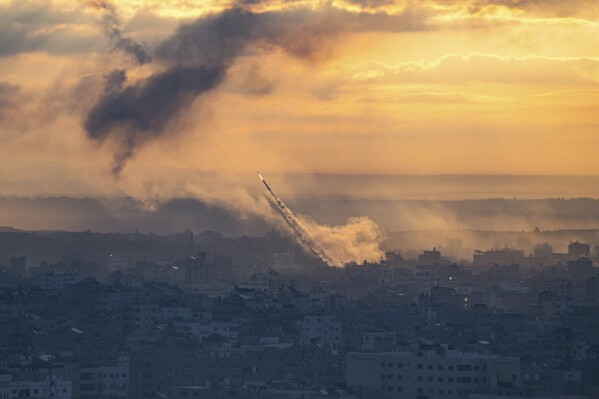 Rockets are fired toward Israel from the Gaza Strip on Saturday, Oct. 7, 2023. (AP Photo/Fatima Shbair)