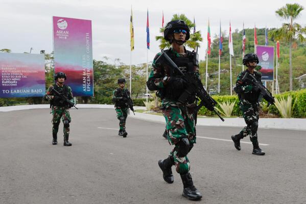 Indonesian Air Force commandos patrol Komodo Airport ahead of the 42nd Southeast the Association of Southeast Asian Nations meetings in Labuan Bajo, East Nusa Tenggara province, Indonesia, Tuesday, May 9, 2023. (Willy Kurniawan/Pool Photo via AP)