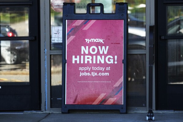 A hiring sign is displayed at a retail store in Vernon Hills, Ill., Tuesday, May 28, 2024. On Thursday, May 30, 2024, the Labor Department reports on the number of people who applied for unemployment benefits last week. (AP Photo/Nam Y. Huh)