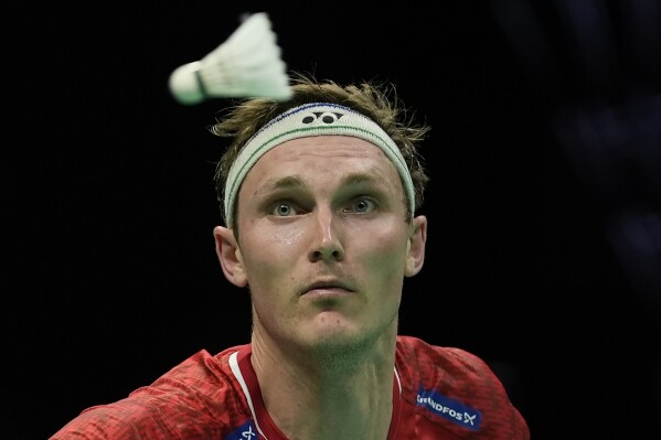FILE - Denmark's Viktor Axelsen eyes a shuttle from Taiwan's Chou Tien Chen in a quarterfinal match of the Thomas Cup Finals held in Chengdu in southwestern China's Sichuan Province, Friday, May 3, 2024. Viktor Axelsen was Europe's only medalist (gold) in Tokyo three years ago, and he was the top qualifier for Paris. At 30, this will be his third Olympics; he won bronze in Rio de Janeiro in 2016. (AP Photo/Ng Han Guan, File)
