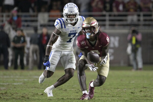 Florida State wide receiver Hykeem Williams (8) catches a pass in front of Duke cornerback Al Blades Jr. (7) during the second half of an NCAA college football game, Saturday, Oct. 21, 2023, in Tallahassee, Fla. (AP Photo/Phelan M. Ebenhack)