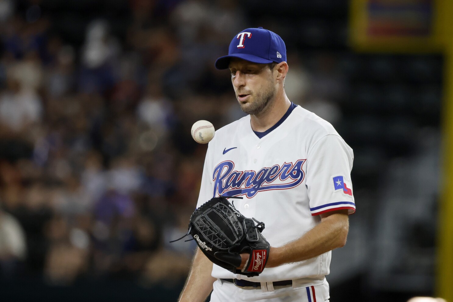 Max Scherzer strikes out 9 over 6 innings in his Rangers debut | AP News