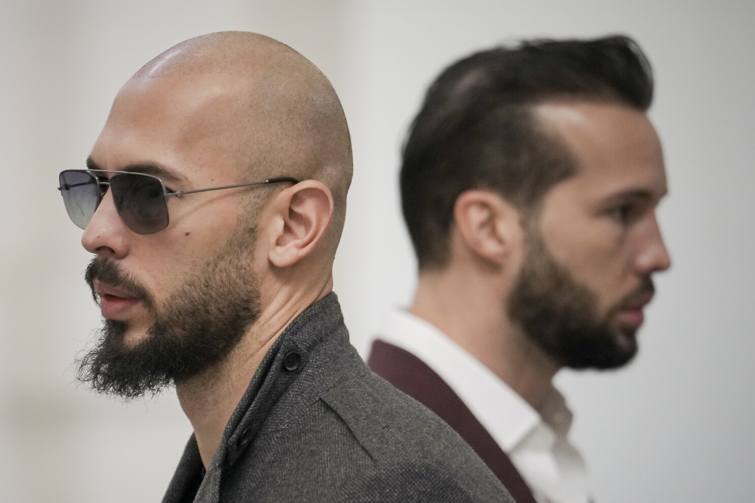 AP PHOTOS: Influencer brothers Andrew and Tristan Tate
