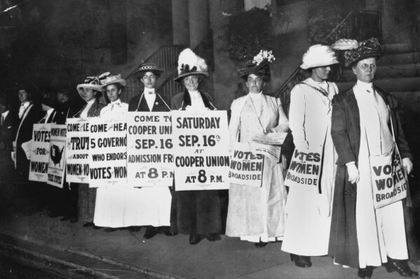 FILE - In this September 1916 file photo, demonstrators hold a rally for women's suffrage in New York. The Seneca Falls convention in 1848 is widely viewed as the launch of the women's suffrage mov...