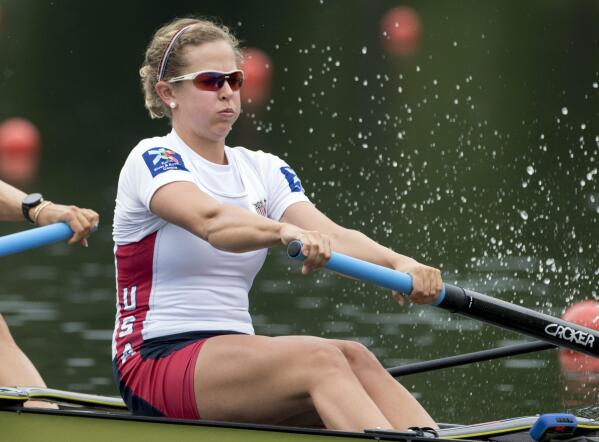 FILE - In this May 29, 2016, file photo, Grace Luczak, right, of the United States, compete at the Women's Pair Final race at the Rowing World Cup on Lake Rotsee in Lucerne, Switzerland. Luczak had left competitive rowing and taken a real job when a move toward gender equity at the Tokyo Games lured her back into a boat. Events were deliberately added to create a more inclusive Olympics and for Luczak it meant four new seats on the U.S. women's rowing team. (Urs Flueeler/Keystone via AP, File)