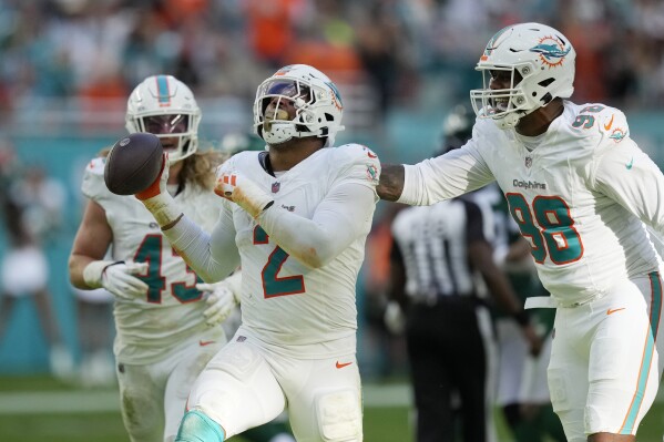 Miami Dolphins linebacker Bradley Chubb (2) celebrates after sacking New York Jets quarterback Trevor Siemian during the second half of an NFL football game, Sunday, Dec. 17, 2023, in Miami Gardens, Fla. (AP Photo/Rebecca Blackwell)