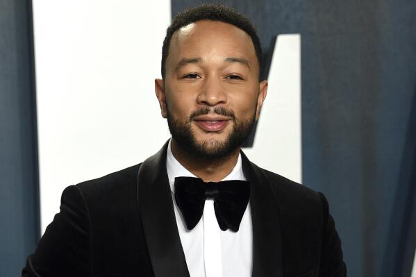 FILE - John Legend appears at the Vanity Fair Oscar Party in Beverly Hills, Calif., on Feb. 9, 2020. Legend, Tony Award-winning producer Mike Jackson and Emmy Award-winner Ty Stiklorius are partnering with the publisher Zando for a new imprint, Get Lifted Books. (Photo by Evan Agostini/Invision/AP, File)
