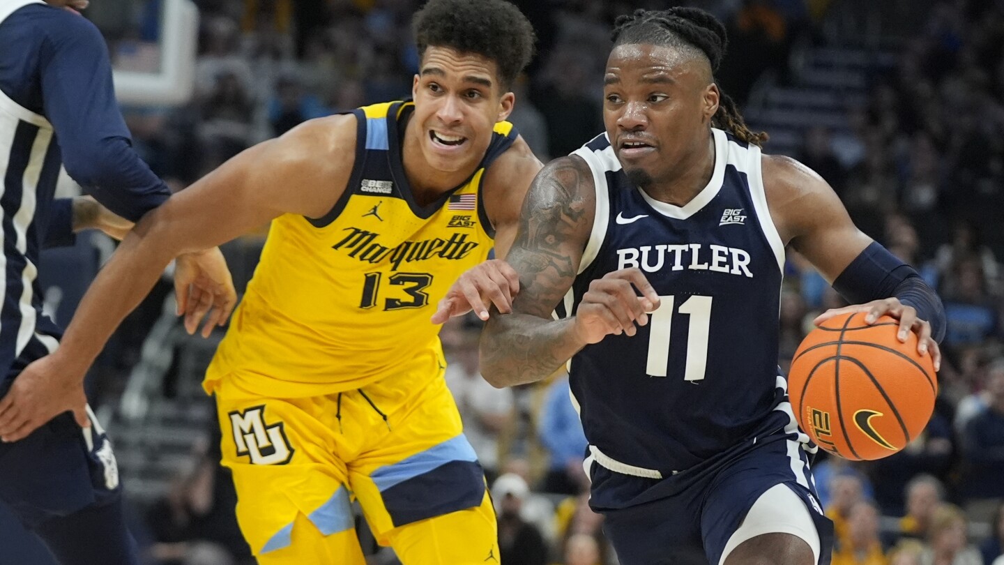 Butler surprises No. 11 Marquette 69-62 on road behind 14 points each ...