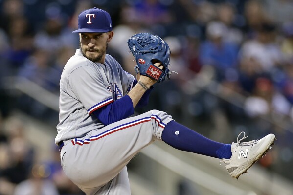 Andrew Heaney of the Texas Rangers pitches in the first inning
