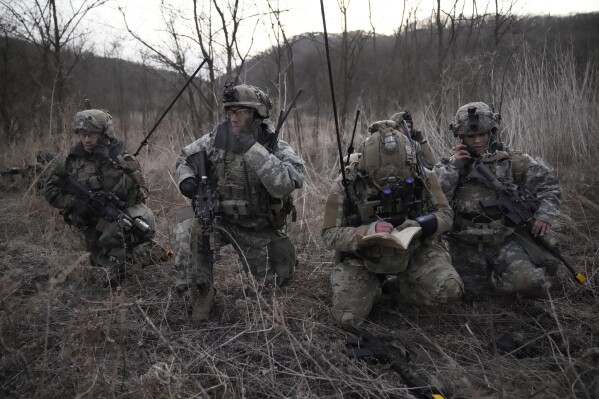 FILE - U.S. soldiers participate in a joint military drill with South Korea in Paju, South Korea, on March 16, 2023. South Korean and U.S. troops will begin their expanded annual military drills next week in response to North Korea’s evolving nuclear threats, the two countries said Wednesday, Feb. 28, 2024, a move that will likely enrage North Korea because it views its rivals’ joint training as an invasion rehearsal. (AP Photo/Lee Jin-man, File)