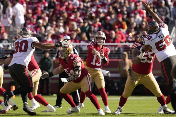 49ers QB Brock Purdy answers skeptics with a nearly flawless 2-game stretch  | AP News