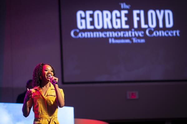Poet, singer and dancer Jaicei performs during a commemorative concert hosted by the George Floyd Foundation at The Fountain of Praise church on Sunday, May 30, 2021, in Houston. Musicians, elected officials and community members joined the family of George Floyd to reflect on his life and the year of fighting for social justice since his murder. (Annie Mulligan/Houston Chronicle via AP)