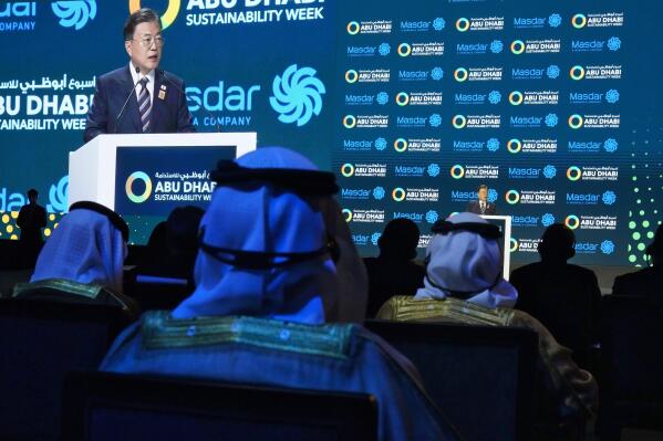 South Korean President Moon Jae-in speaks during Abu Dhabi Sustainability Week at Dubai Expo 2020 in Dubai, United Arab Emirates, Monday, Jan. 17, 2022. The president of South Korea on Monday vowed to world leaders that his fossil fuel-dependent country and the oil-rich United Arab Emirates would jointly expand their investments in renewable energy to tackle climate change. (AP Photo/Jon Gambrell)