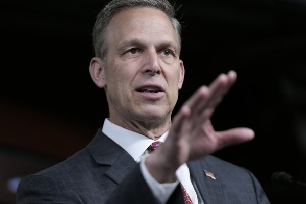 FILE - Rep. Scott Perry, R-Pa., chair of the House Freedom Caucus, speaks during a news conference on Capitol Hill in Washington, July 14, 2023. A federal judge is ordering Republican Rep. Scott Perry of Pennsylvania to turn over more than 1,600 texts and emails to FBI agents investigating efforts to keep President Donald Trump in office after his 2020 election loss and illegally block the transfer of power to Democrat Joe Biden. The ruling, late Monday, came more than a year after Perry’s personal cellphone was seized by federal authorities. (AP Photo/Patrick Semansky, File)