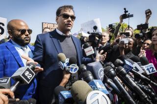 U.S. Rep. George Santos speaks to the media outside the federal courthouse in Central Islip, N.Y on Wednesday, May 10, 2023. No mugshot of Santos has been released following his Wednesday arraignment on federal charges, contrary to claims on social media. An image of him circulating online was taken in January at the U.S. Capitol. (AP Photo/Stefan Jeremiah)