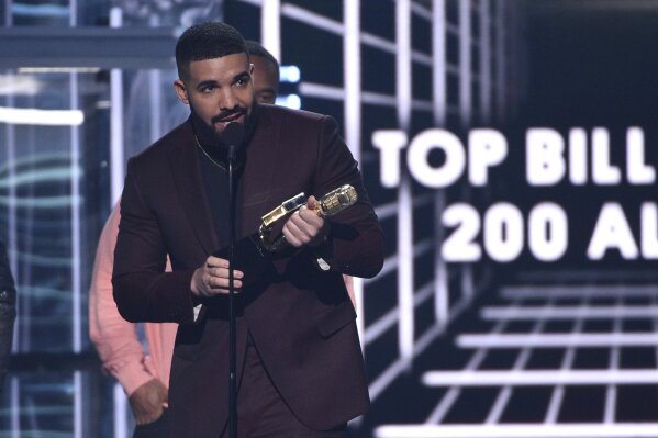 
              Drake accepts the top billboard 200 album award for "Scorpion" at the Billboard Music Awards on Wednesday, May 1, 2019, at the MGM Grand Garden Arena in Las Vegas. (Photo by Chris Pizzello/Invision/AP)
            