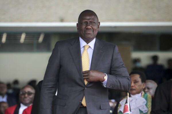 FILE - Kenya's new president William Ruto arrives to be sworn in to office at a ceremony held at Kasarani stadium in Nairobi, Kenya Tuesday, Sept. 13, 2022. Five people have been killed in a Kenyan border village as concerns grow over increasing attacks in the country. The weekend killings raise the death toll over the last month to more than 30 people — including soldiers, police reservists and civilians. (AP Photo/Brian Inganga, File)