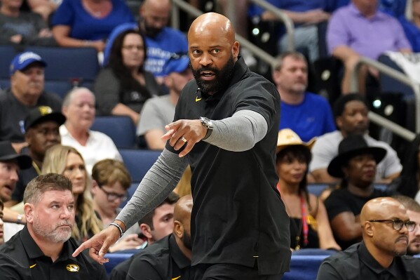 FILE - Missouri head coach Cuonzo Martin calls a play during the second half of an NCAA men's college basketball Southeastern Conference tournament game against Mississippi Wednesday, March 9, 2022, in Tampa, Fla. Missouri State hired Cuonzo Martin on Wednesday, March 27, 2024, bringing back the only coach to lead the program to a Missouri Valley Conference regular-season title more than a decade after he left Springfield for stints in power conferences. (AP Photo/Chris O'Meara, File)
