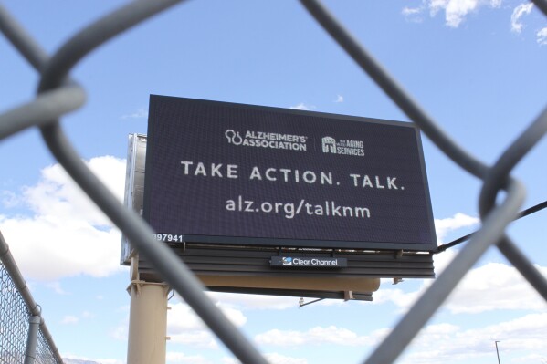 A billboard flashes a message as part of a new statewide Alzheimer's awareness campaign that includes digital advertisements around in Albuquerque, N.M., Wednesday, March 12, 2025. (AP Photo/Susan Montoya Bryan)