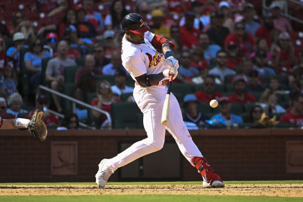 St. Louis Cardinals' Jordan Walker hits a solo home run in the eighth inning of a baseball game against the Philadelphia Phillies, Sunday, Sept. 17, 2023, in St. Louis. (AP Photo/Joe Puetz)
