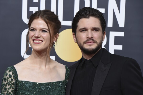 FILE - Rose Leslie, left, and Kit Harington arrive at the 77th annual Golden Globe Awards on Jan. 5, 2020, in Beverly Hills, Calif. The "Game of Thrones" stars have welcomed their second child. A publicist for Harington confirmed Monday that the couple, who famously met on the set of “Game of Thrones," have added a daughter to their family. (Photo by Jordan Strauss/Invision/AP, File)