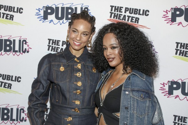 FILE - Alicia Keys, left, and Maleah Joi Moon attend the "Hell's Kitchen" Off-Broadway opening night at The Public Theater on Sunday, Nov. 19, 2023, in New York. Keys semi-autobiographical stage musical is moving from off-Broadway to the Shubert Theatre this spring. (Photo by Andy Kropa/Invision/AP, File)
