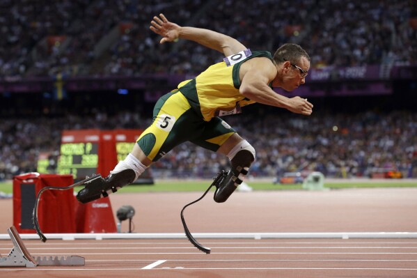 FILE - South Africa's Oscar Pistorius starts in the men's semi-finals of the 400-meter in the Olympic Stadium at the 2012 Summer Olympics, London on Aug. 5, 2012. Oscar Pistorius is due on Friday, Jan. 5, 2024 to be released from prison on parole to live under strict conditions at a family home after serving nearly nine years of his murder sentence for the shooting death of girlfriend Reeva Steenkamp on Valentine’s Day 2013. (AP Photo/Anja Niedringhaus, File)