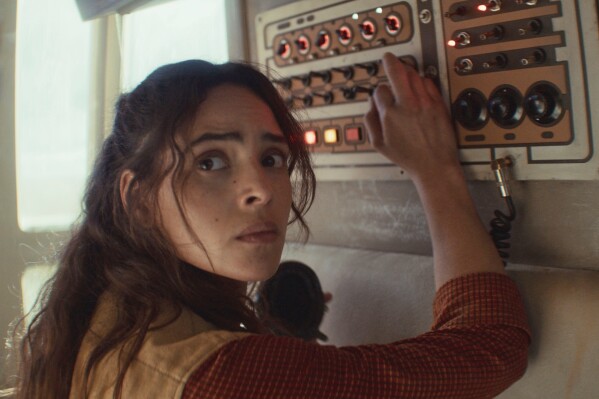 This image released by Disney+ shows Adria Arjona, as Bix Caleen, in a scene from "Andor." (Lucasfilm Ltd./Disney+ via AP)