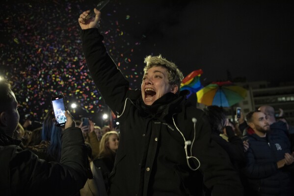 A supporter of the same-sex marriage bill, reacts during a rally at central Syntagma Square, in Athens, Greece, Thursday, Feb. 15, 2024. Greece's lawmakers approved a bill that allows same-sex marriage, making the country the first Orthodox Christian to do so. (AP Photo/Michael Varaklas)