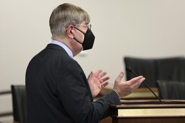 South Carolina Department of Health and Environmental Control Director Dr. Edward Simmer testifies before a Senate subcommittee considering changes in the state's public health laws in the wake of the COVID-19 pandemic on Thursday, March 14, 2024, in Columbia, S.C. (AP Photo/Jeffrey Collins)