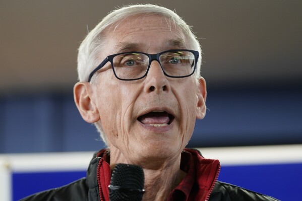 FILE - Wisconsin Democratic Gov. Tony Evers speaks at a campaign stop, Oct. 27, 2022, in Milwaukee. Republicans who control the Wisconsin Senate plan to vote on overriding three of Gov. Evers’ vetoes, including one that attempted to enshrine school funding increases for 400 years. Republicans have the necessary two-thirds majority to override the vetoes in the Senate on Thursday, Sept. 14, 2023 but they don’t have enough votes in the Assembly. (AP Photo/Morry Gash, File)