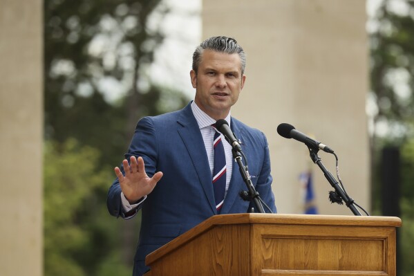 U.S. Defense Secretary Pete Hegseth delivers a speech at the US cemetery to commemorate the 81st anniversary of the D-Day landings, Friday, June 6, 2025 in Colleville-sur-Mer, Normandy. (AP Photo/Thomas Padilla)