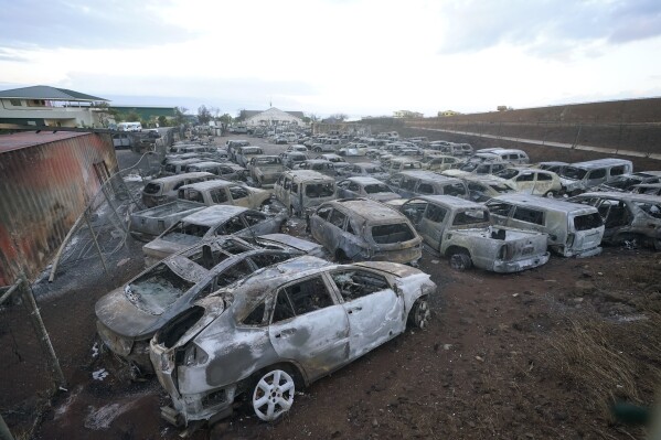 Wildfire wreckage is shown Friday, Aug. 11, 2023, in Lahaina, Hawaii. (AP Photo/Rick Bowmer)