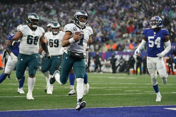 New York Giants wide receiver Isaiah Hodgins (18) runs with the ball  against the Washington Commanders during an NFL football game Sunday, Dec. 4,  2022, in East Rutherford, N.J. (AP Photo/Adam Hunger