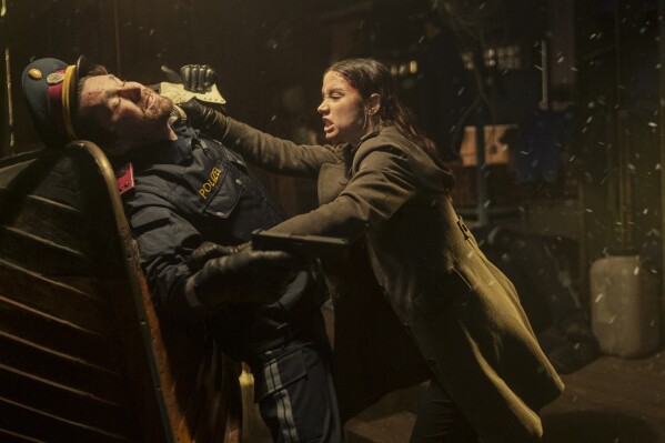 This image released by Lionsgate shows Ana de Armas in a scene from "Ballerina." (Larry D. Horricks/Lionsgate via AP)