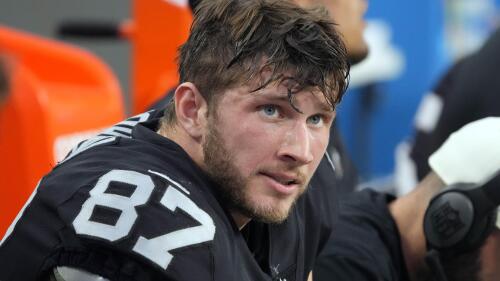 FILE - Las Vegas Raiders tight end Foster Moreau (87) watches from the sideline during the first half of an NFL football game against the Kansas City Chiefs, Saturday, Jan. 7, 2023, in Las Vegas. NFL tight end Foster Moreau has signed a three-year, $12 million contract with the Saints less than two months after being diagnosed with Hodgkin lymphoma during a physical with New Orleans, Moreau's agent said Wednesday, May 10, 2023. (AP Photo/Rick Scuteri, File)