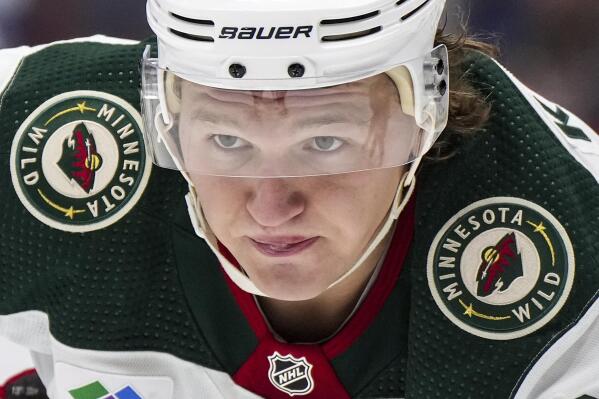 Minnesota Wild's Kirill Kaprizov waits for a faceoff against the Vancouver Canucks during the third period of an NHL hockey game Thursday, March 2, 2023, in Vancouver, British Columbia. (Darryl Dyck/The Canadian Press via AP)