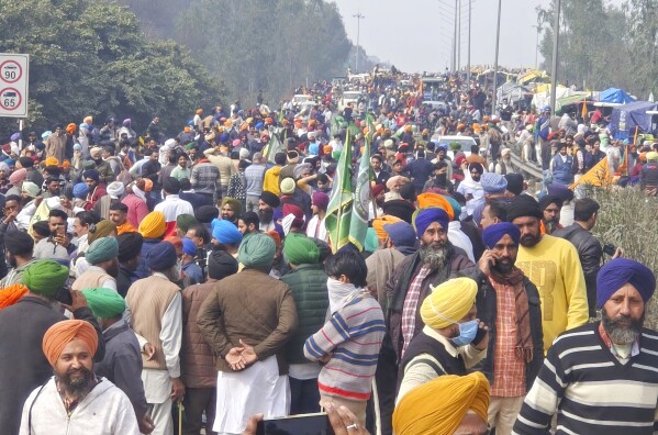 Farmers marching to New Delhi gather near the Punjab-Haryana border at Shambhu, India, Tuesday, Feb.13, 2024. Farmers are marching to the Indian capital asking for a guaranteed minimum support price for all farm produce. (AP Photo/Rajesh Sachar)