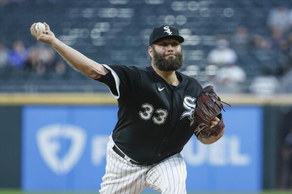 White Sox pitcher Lance Lynn and coach Joe McEwing argue in dugout