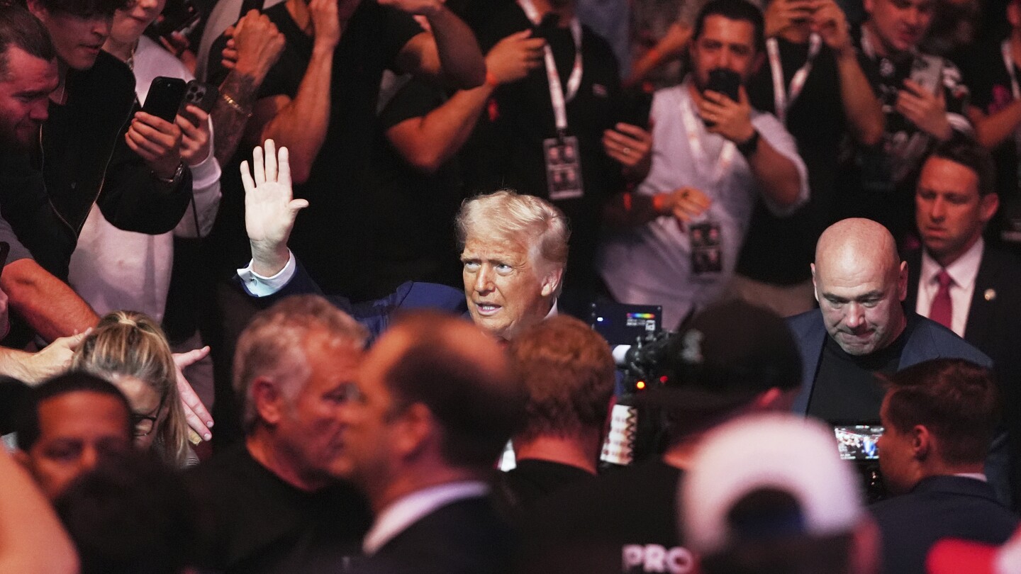 Trump attends UFC championship fight in New Jersey, taking a break from Musk feud for cage fights - AP News