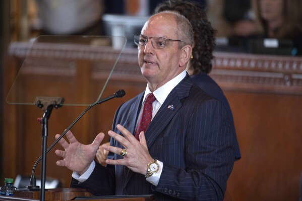 FILE - Gov. John Bel Edwards delivers his address to members of the House and Senate in a joint session to kick off the 2023 regular legislative session, April 10, 2023 at the State Capitol in Baton Rouge. The race to replace Edwards tops the list of contests Louisiana voters will decide Saturday in one of only three gubernatorial elections scheduled for this year. (Travis Spradling/The Advocate via AP, Pool)