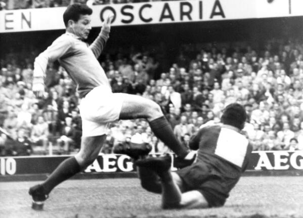 FILE - France's Just Fontaine, left, tries to go past Brazil's goalkeeper Gilmar tackles in their semifinal match in Stockholm, on June 24, 1958. Fontaine's former club Reims announced Fontaine's death on Wednesday, March 1, 2023. He was 89. (AP Photo/Reportagebild, Pool, File)