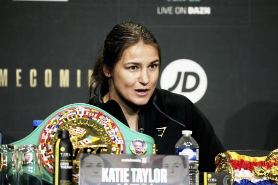 Ireland's Katie Taylor, the undisputed Lightweight champion, speaks to the media during a press conference in Dublin, Ireland, Thursday, May 18, 2023. Taylor’s success has been paving the way for young Irish fighters as women’s boxing gains popularity around the world. (AP Photo/Peter Morrison)