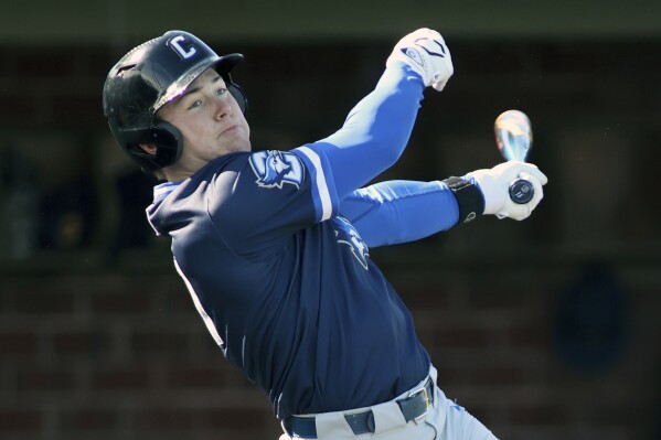 FILE - Creighton infielder Ben North (11) swings during an NCAA baseball game against Coppin State, Sunday, Feb. 18, 2024, in Hanover, Md. Creighton’s Ben North turned in one of the eye-popping performances of the first two weeks of the college baseball season when he hit grand slams in his first two at-bats against Houston Christian on Friday, Feb. 23. (AP Photo/Daniel Kucin Jr., File)